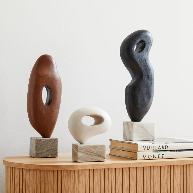 wooden sculptures are a great way to elevate your home decor and these elegant pieces can be found at West Elm