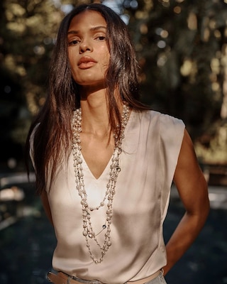 a sexy silk top that is perfect for day or night depending on the outfit style. It can be exclusively found at WHBM